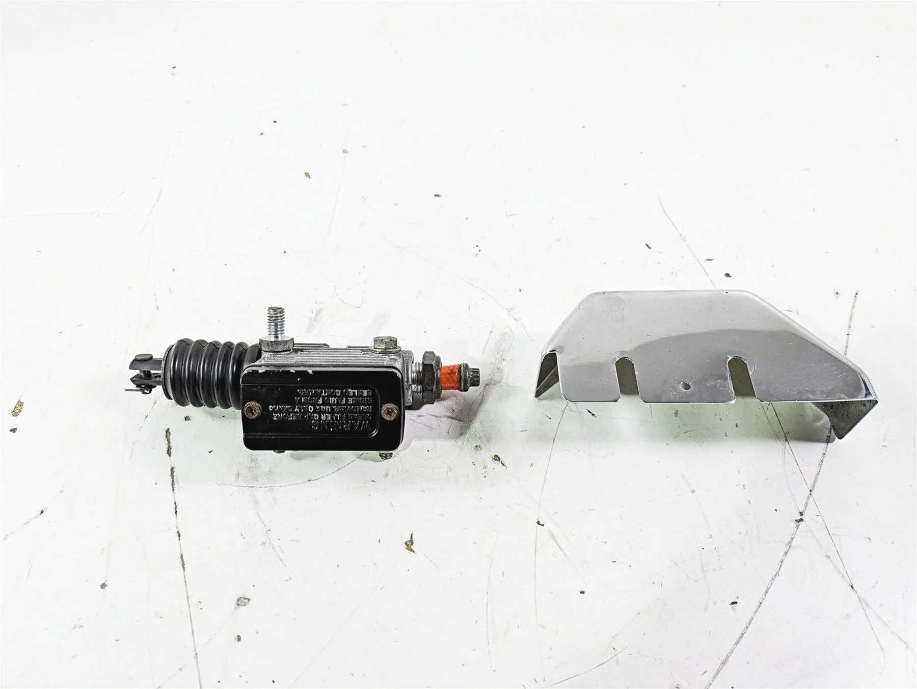 1992 Harley FLSTC Softail Heritage Rear Brake Master Cylinder + Cover 42468-87E