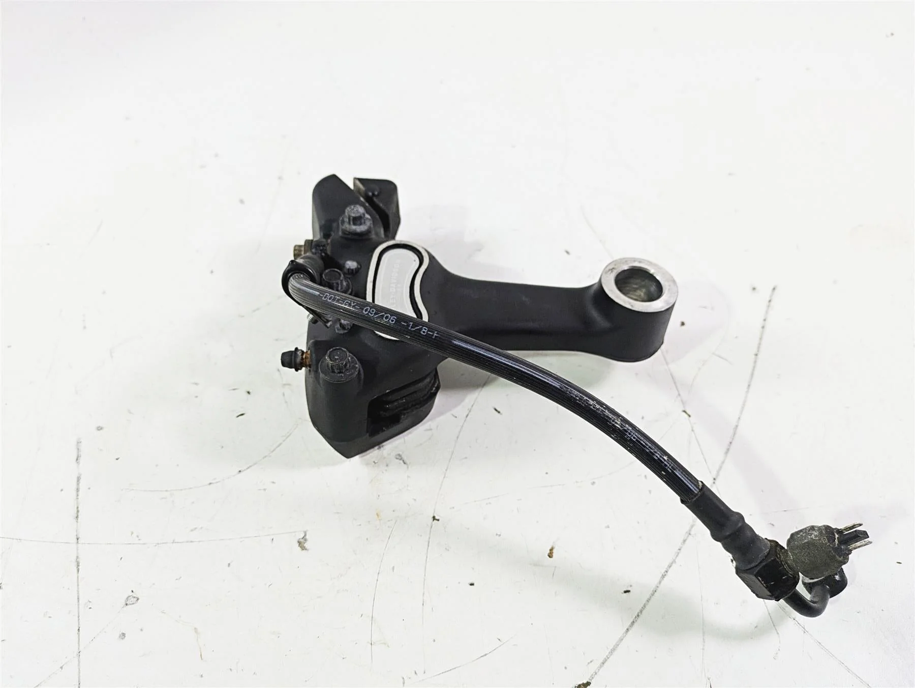 2007 Harley FXDWG Dyna Wide Glide Rear Brake Caliper + Line 44017-06 - Image 4