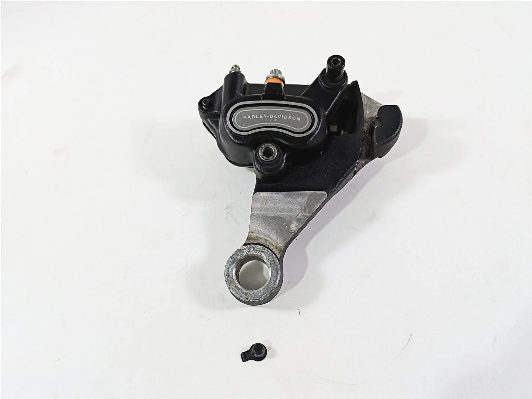 2009 Harley FLSTSB Cross Bones Rear Brake Caliper & Bracket 40908-08 42895-08A