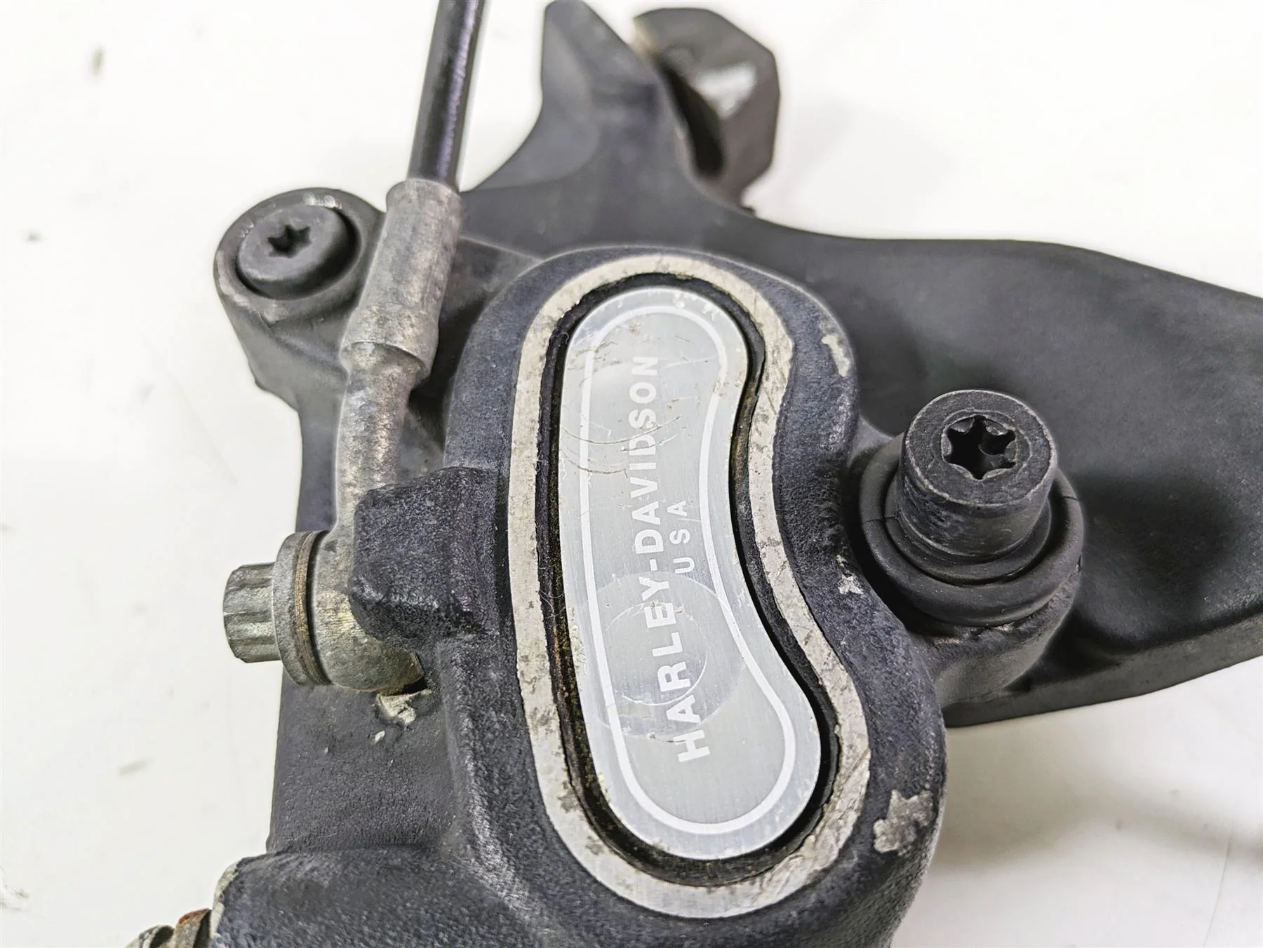2012 Harley FLD Dyna Switchback Rear Brake Caliper & Bracket 40908-08 - Image 7