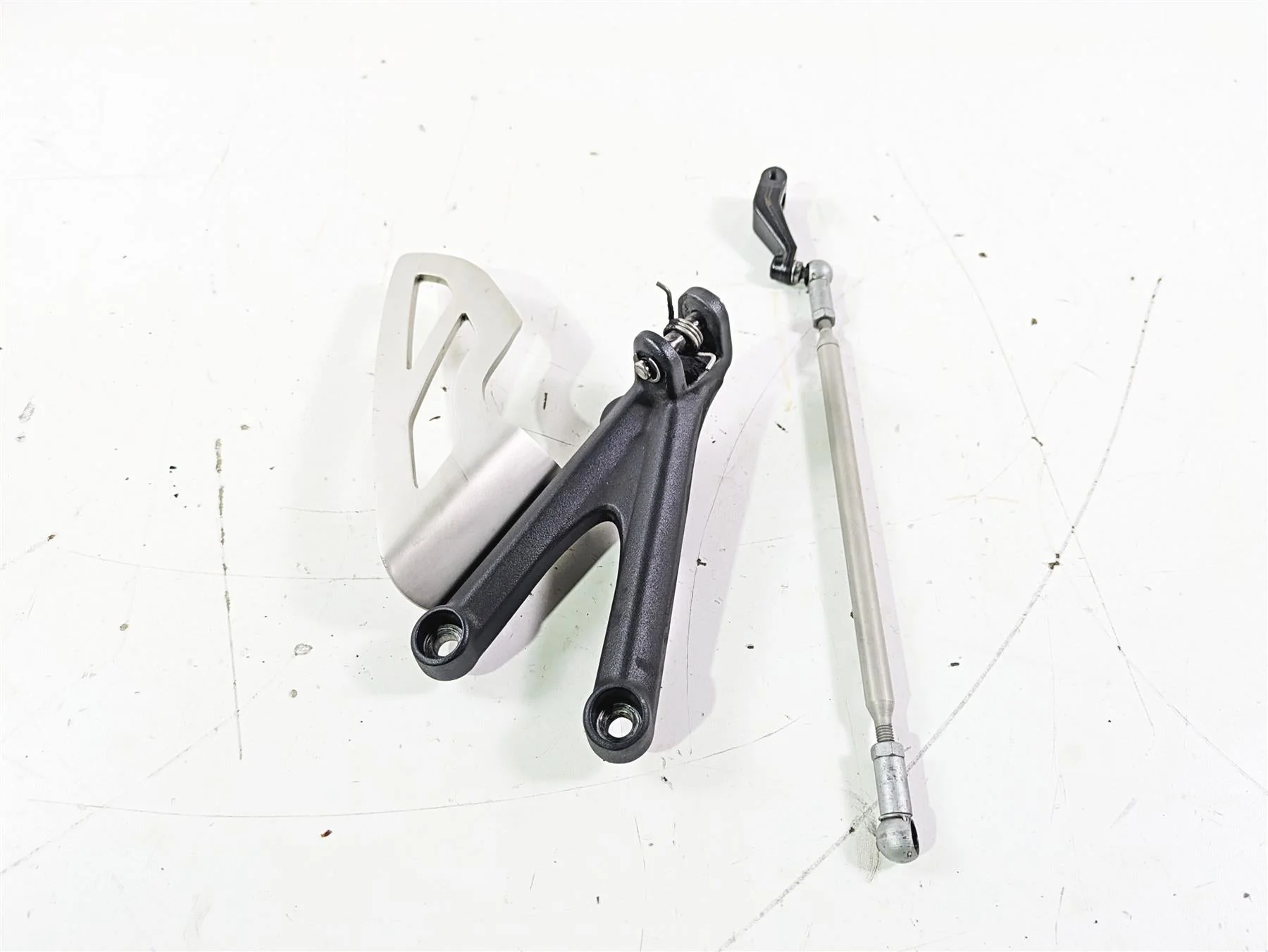 2012 Triumph Daytona 675 Left Rider Footpeg Mount + Shifter Parts T2082066