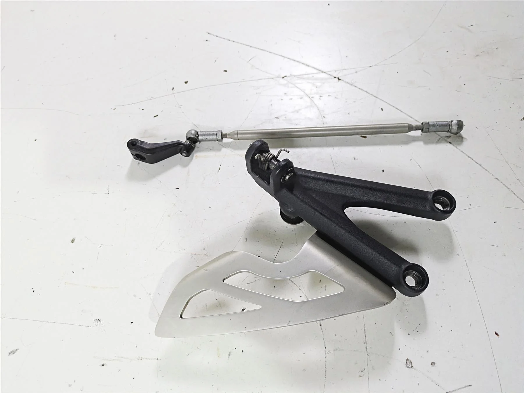 2012 Triumph Daytona 675 Left Rider Footpeg Mount + Shifter Parts T2082066 - Image 2
