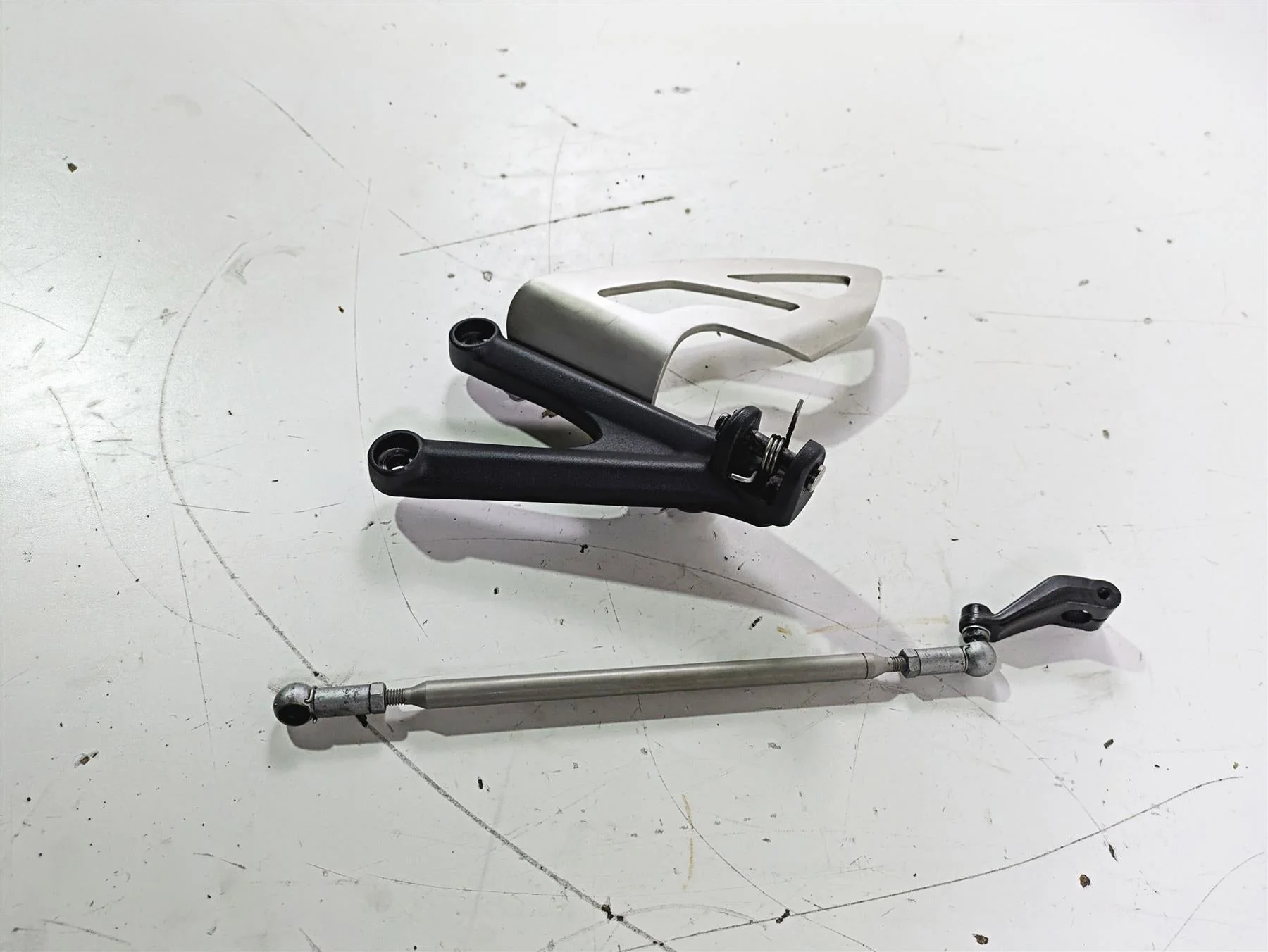 2012 Triumph Daytona 675 Left Rider Footpeg Mount + Shifter Parts T2082066 - Image 3