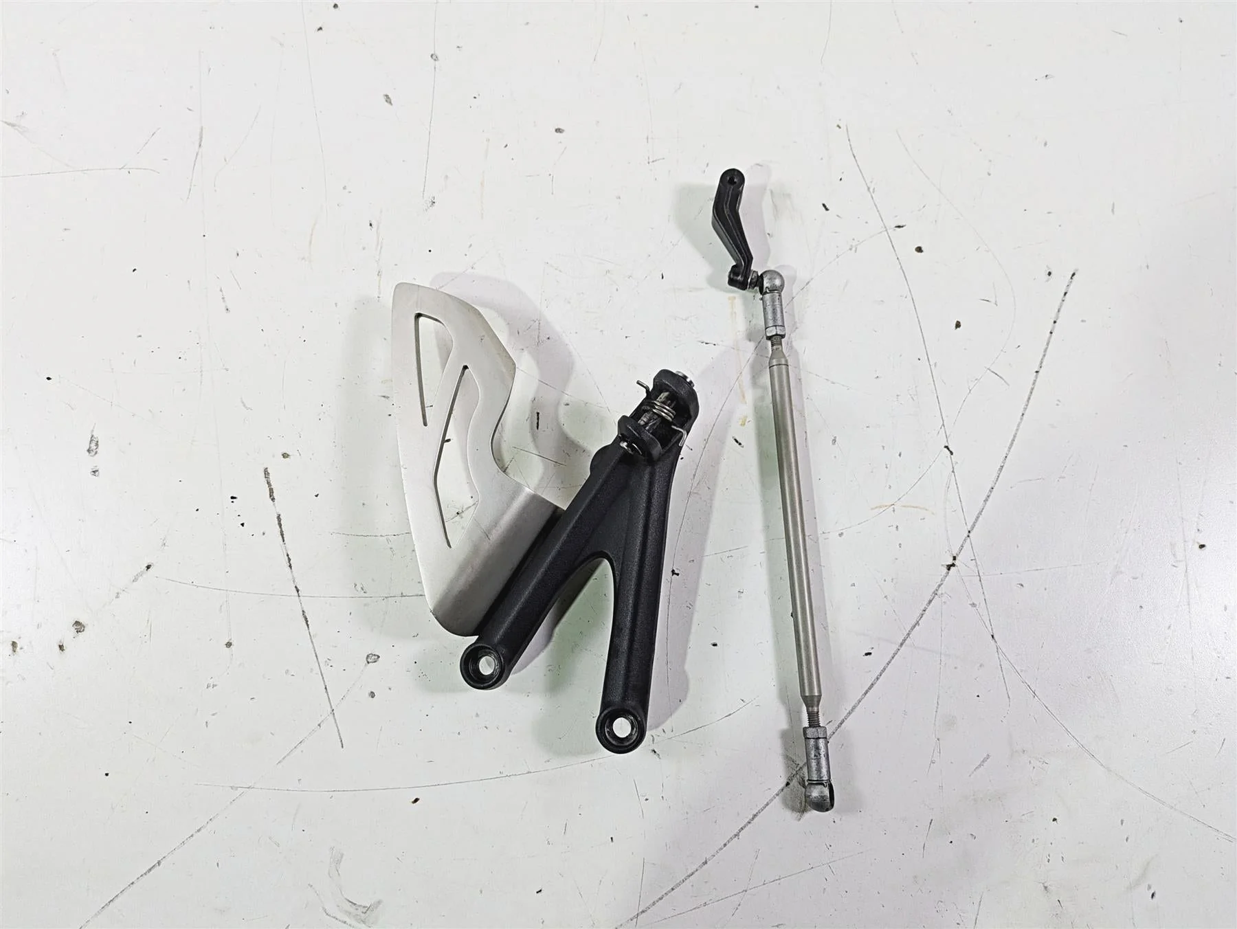 2012 Triumph Daytona 675 Left Rider Footpeg Mount + Shifter Parts T2082066 - Image 4