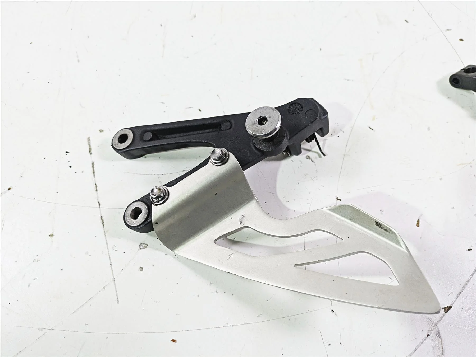 2012 Triumph Daytona 675 Left Rider Footpeg Mount + Shifter Parts T2082066 - Image 7