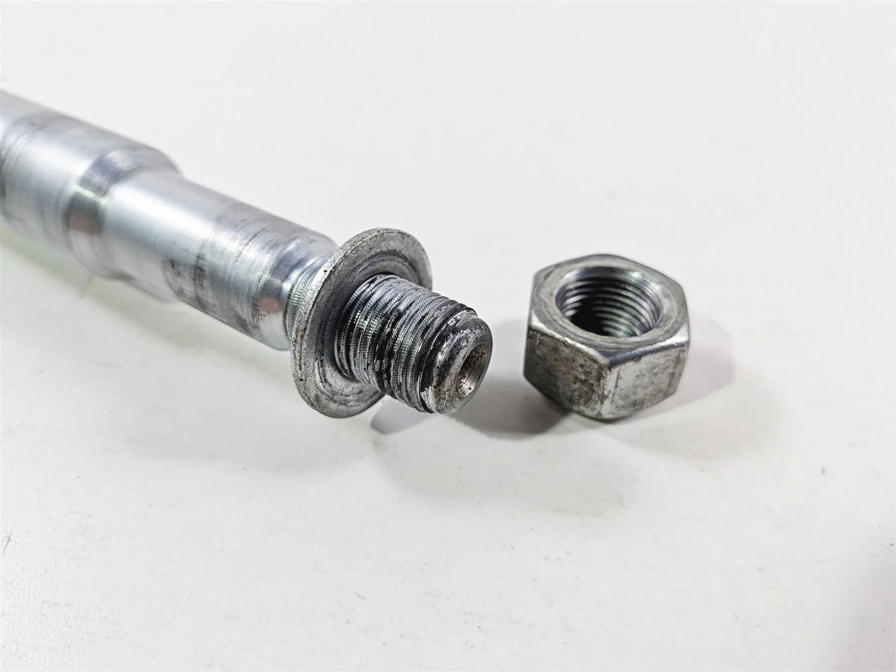2014 Harley Touring FLHTK Electra Glide Front Axle Wheel Spindle 41547-07A - Image 8