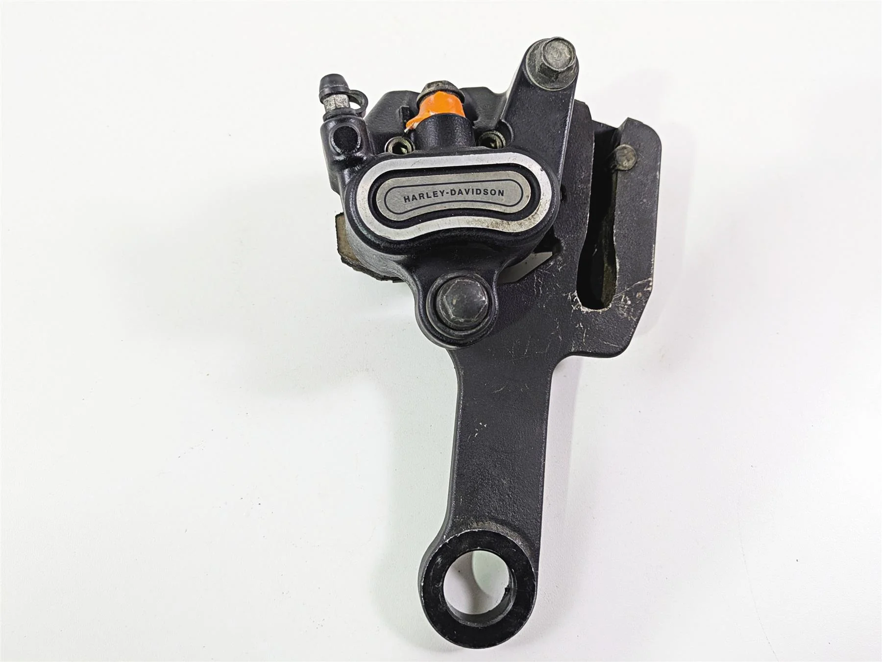 2018 Harley FLHCS Softail Heritage 115th Rear Brake Caliper & Bracket 41300192