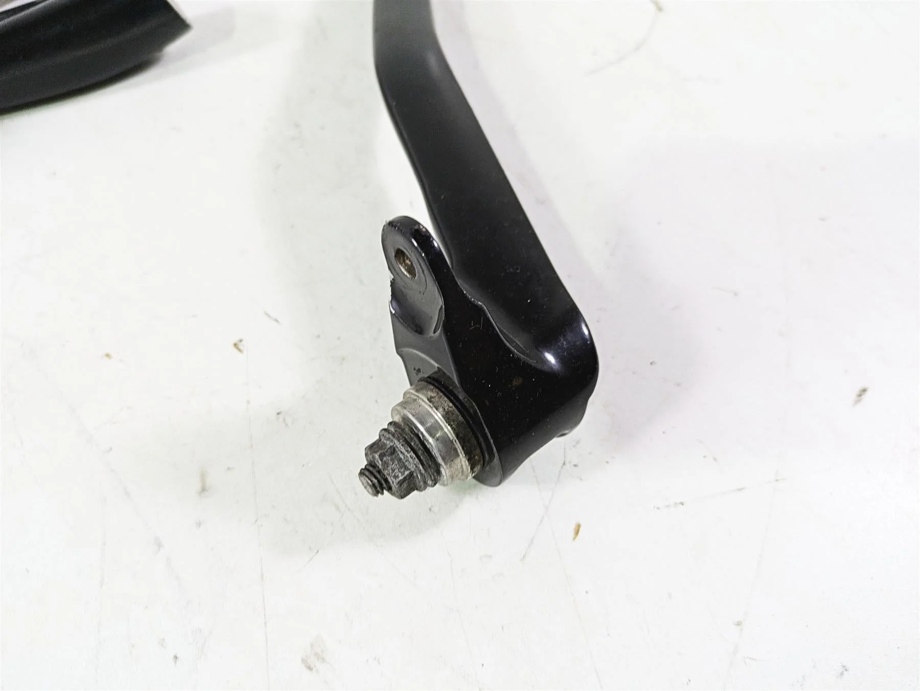 2018 Harley Softail FXFBS Fat Bob Right Rider Footpeg & Brake Pedal 50500746 - Image 5