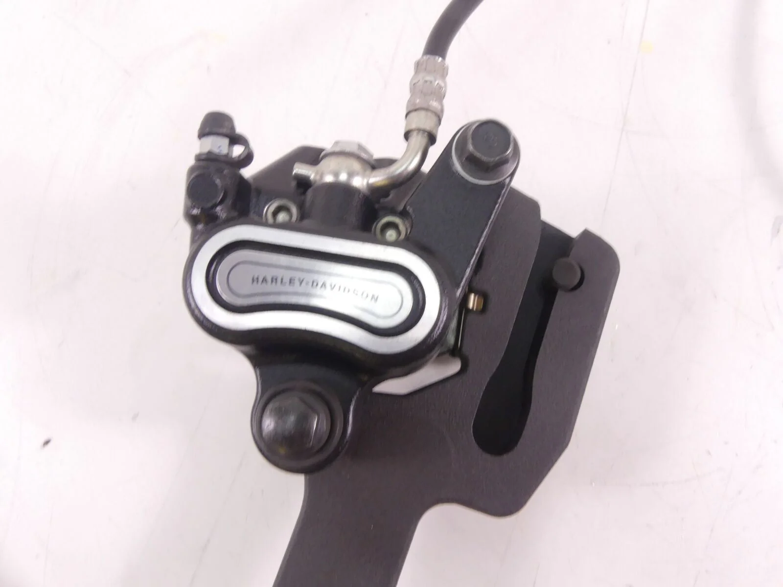 2019 Harley Softail FXBB Street Bob Rear Brake Caliper + Line & Mount 41300192 - Image 6