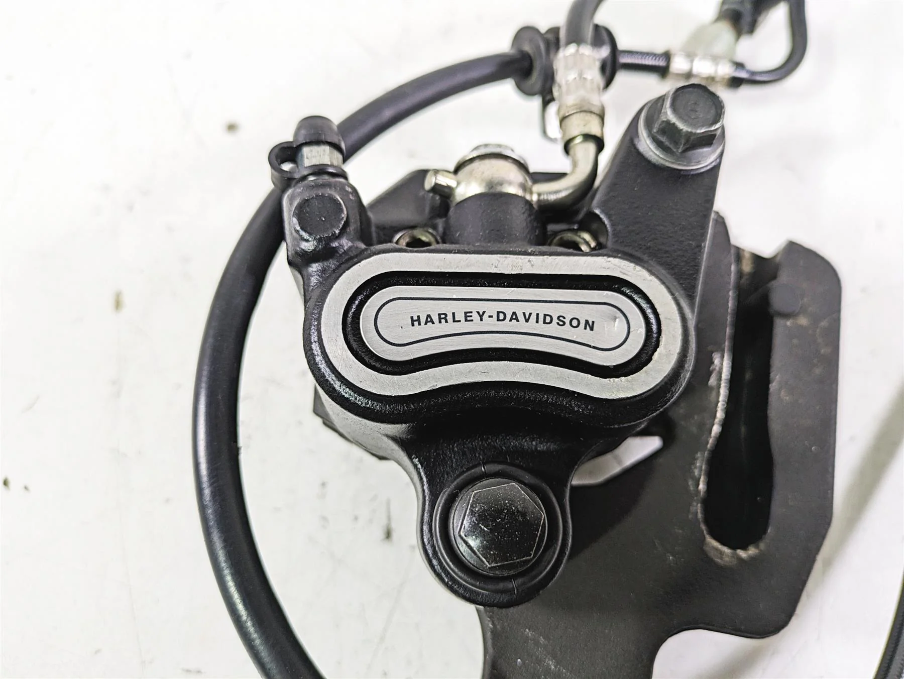 2021 Harley Softail FLSL Slim Rear Brake Caliper & Bracket 41300192 - Image 7