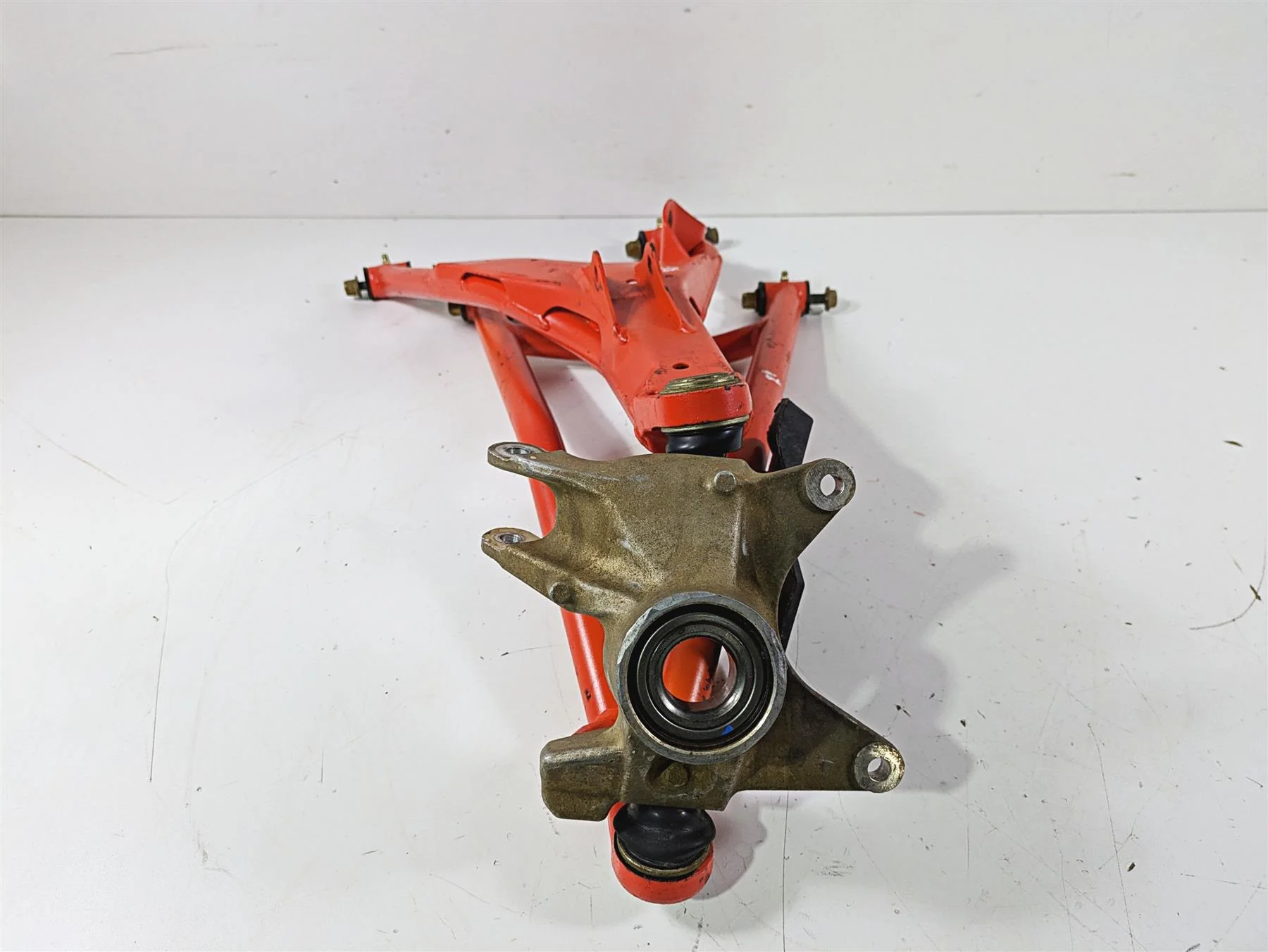 2022 Can-Am Defender XMR HD10 Front Right Control Arm Knee Magma Red 706204748 - Image 2
