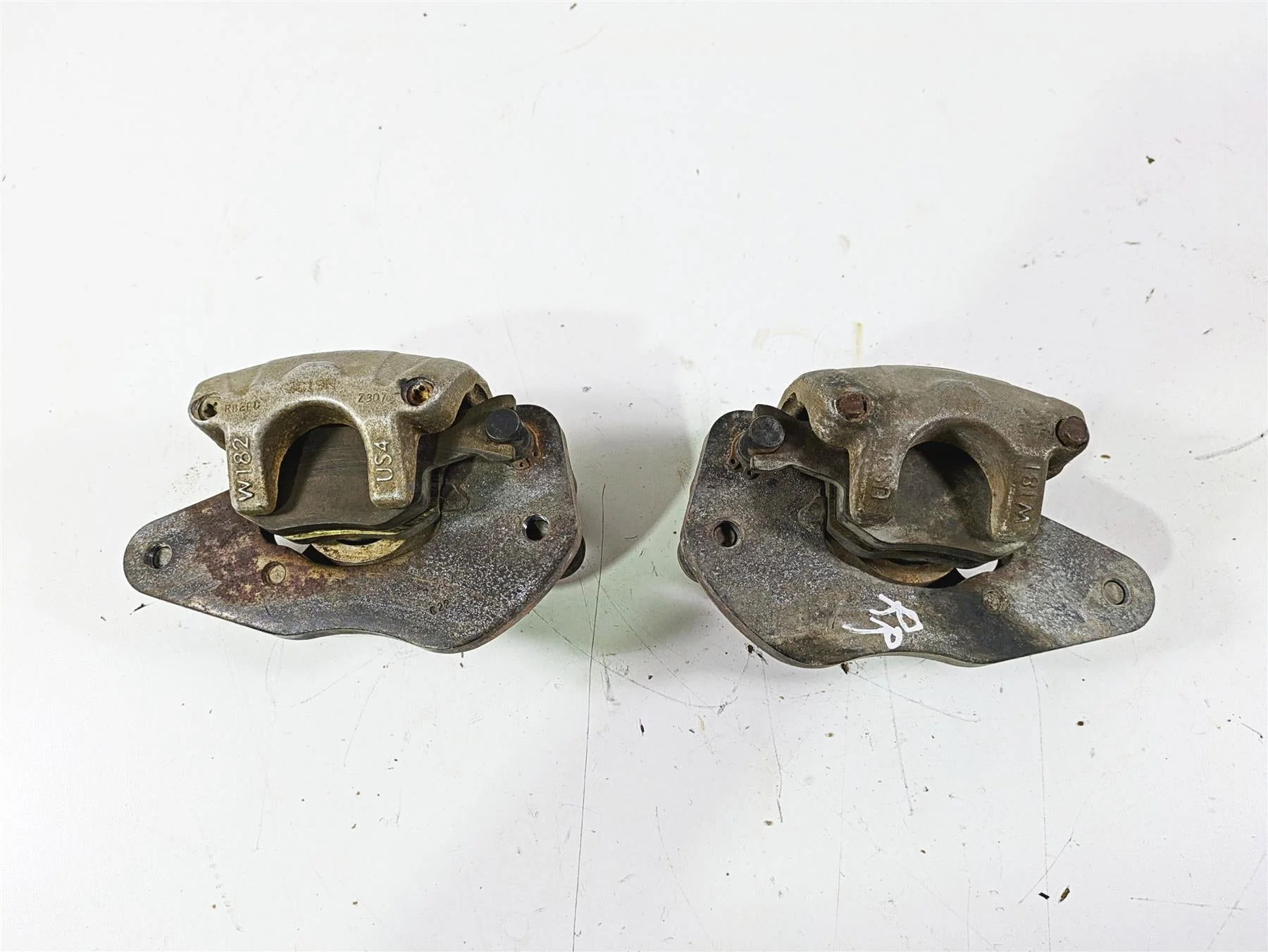 2022 Can-Am Defender XMR HD10 Rear Brake Caliper Set 705601928 705601929