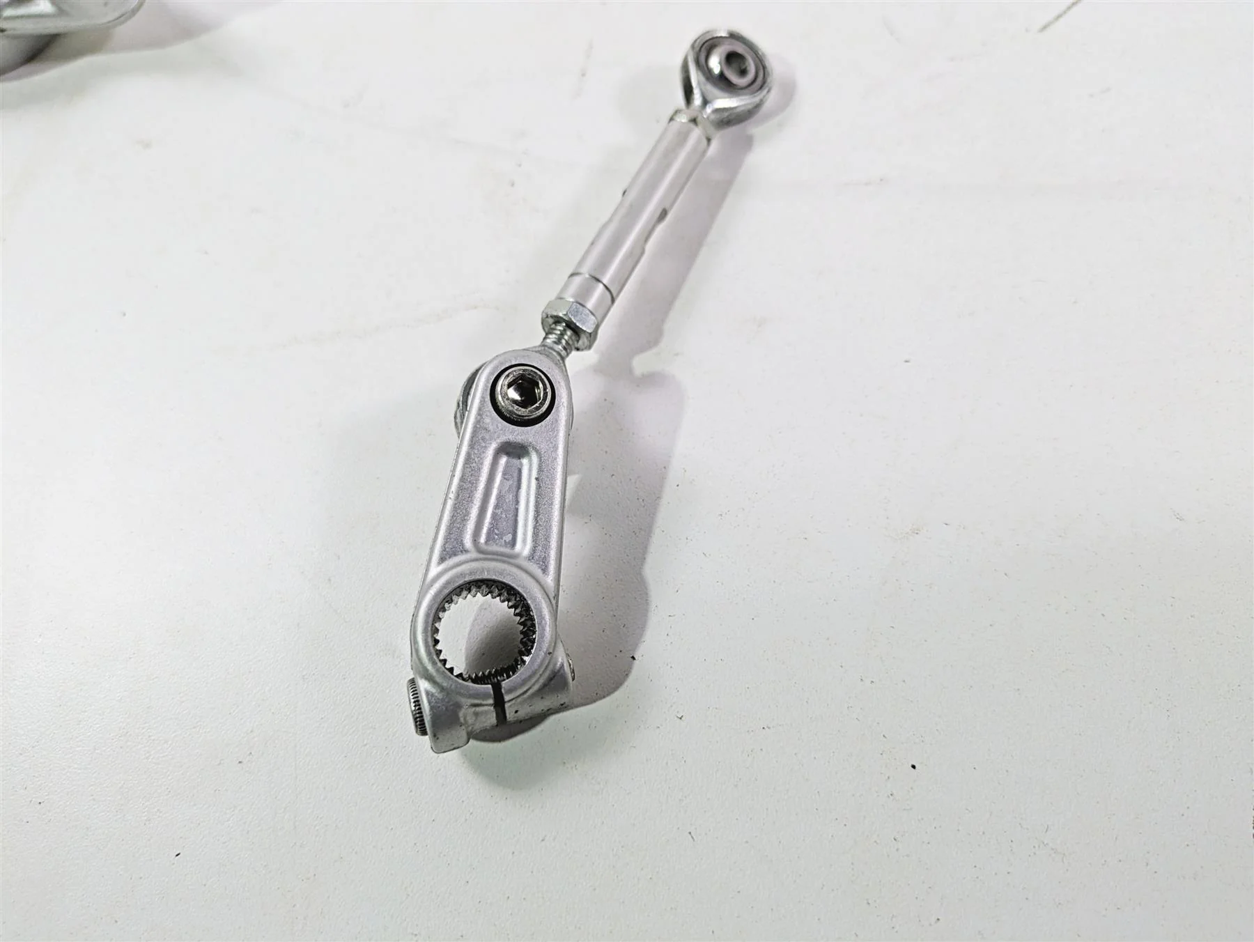 2022 Ducati Hypermotard 950 Left Footpeg Mount & Shifter linkage 82413571A - Image 11