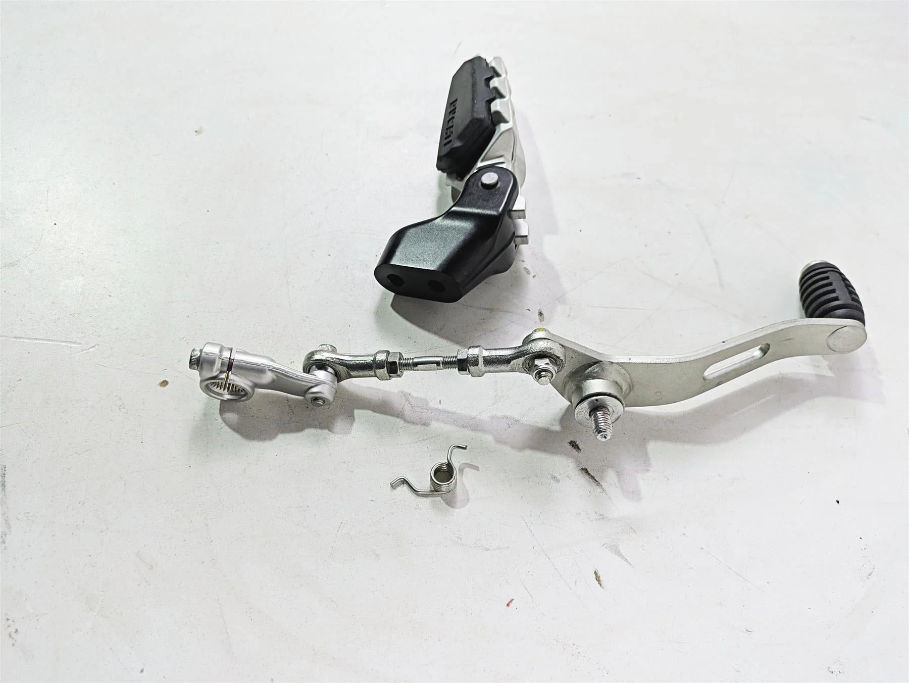 2022 Ducati Scrambler Desert Sled Left Front Foot Peg Mount & Shifter 82433661A - Image 3
