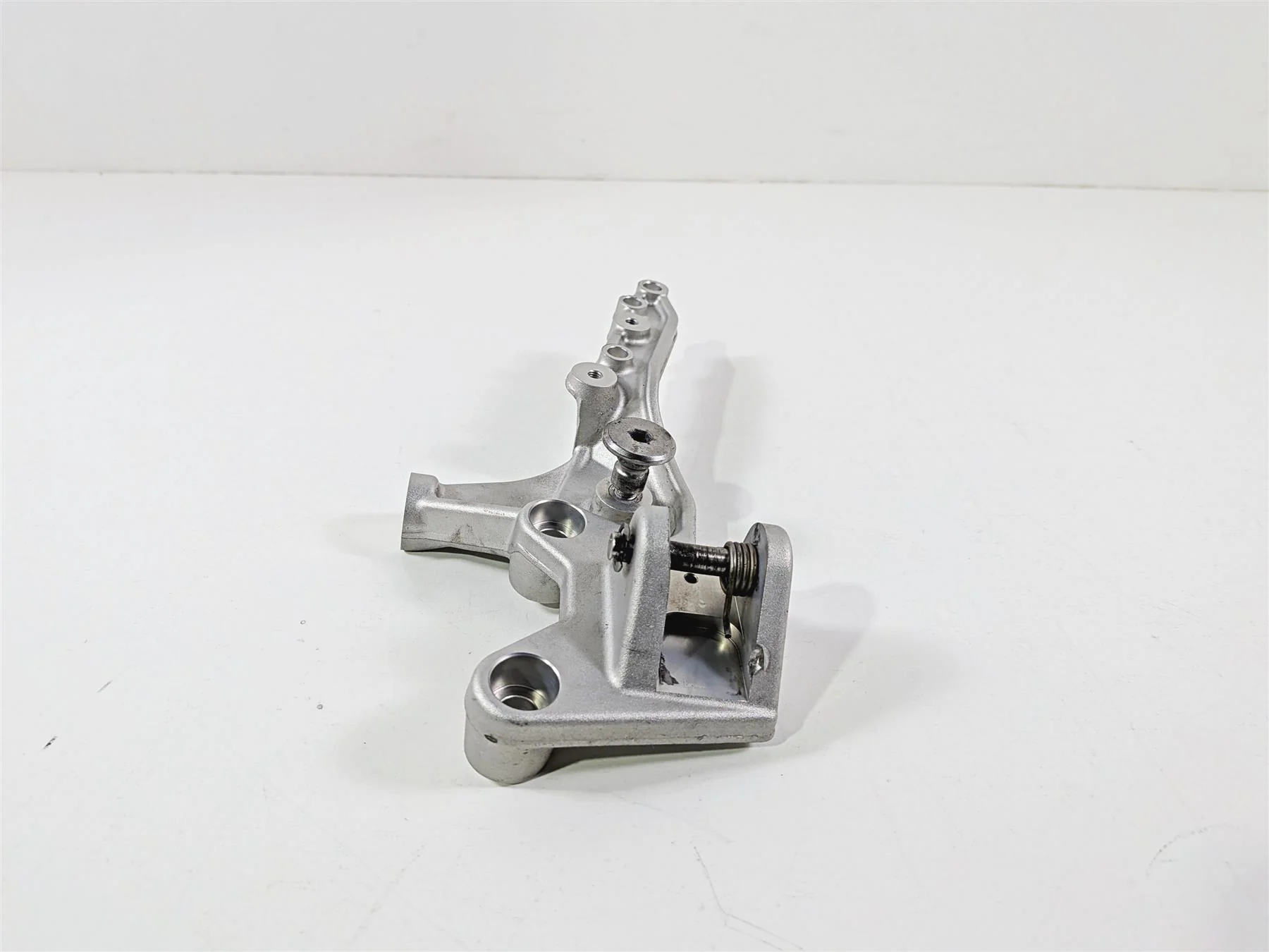 2022 Triumph Tiger 900 GT Pro Right Front Foot Peg Mount T2082358 - Image 2