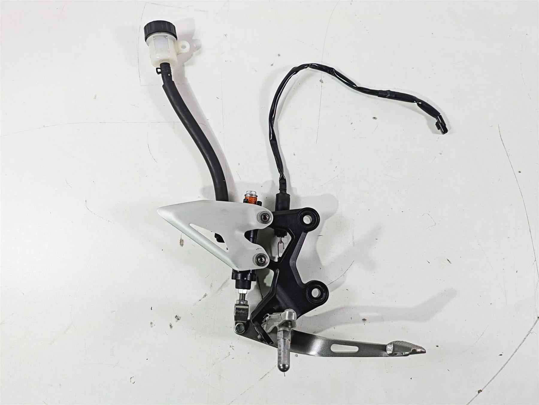 2023 Kawasaki EX400 Ninja Right Footpeg + Brake Lever Master Cylinder 35063-1408