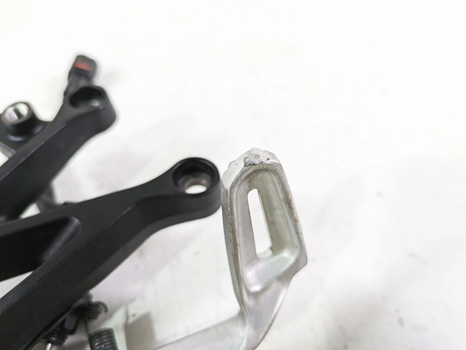2023 Triumph Street Triple 765 RS Right Rider Footpeg & Brake Pedal T2082484 - Image 11