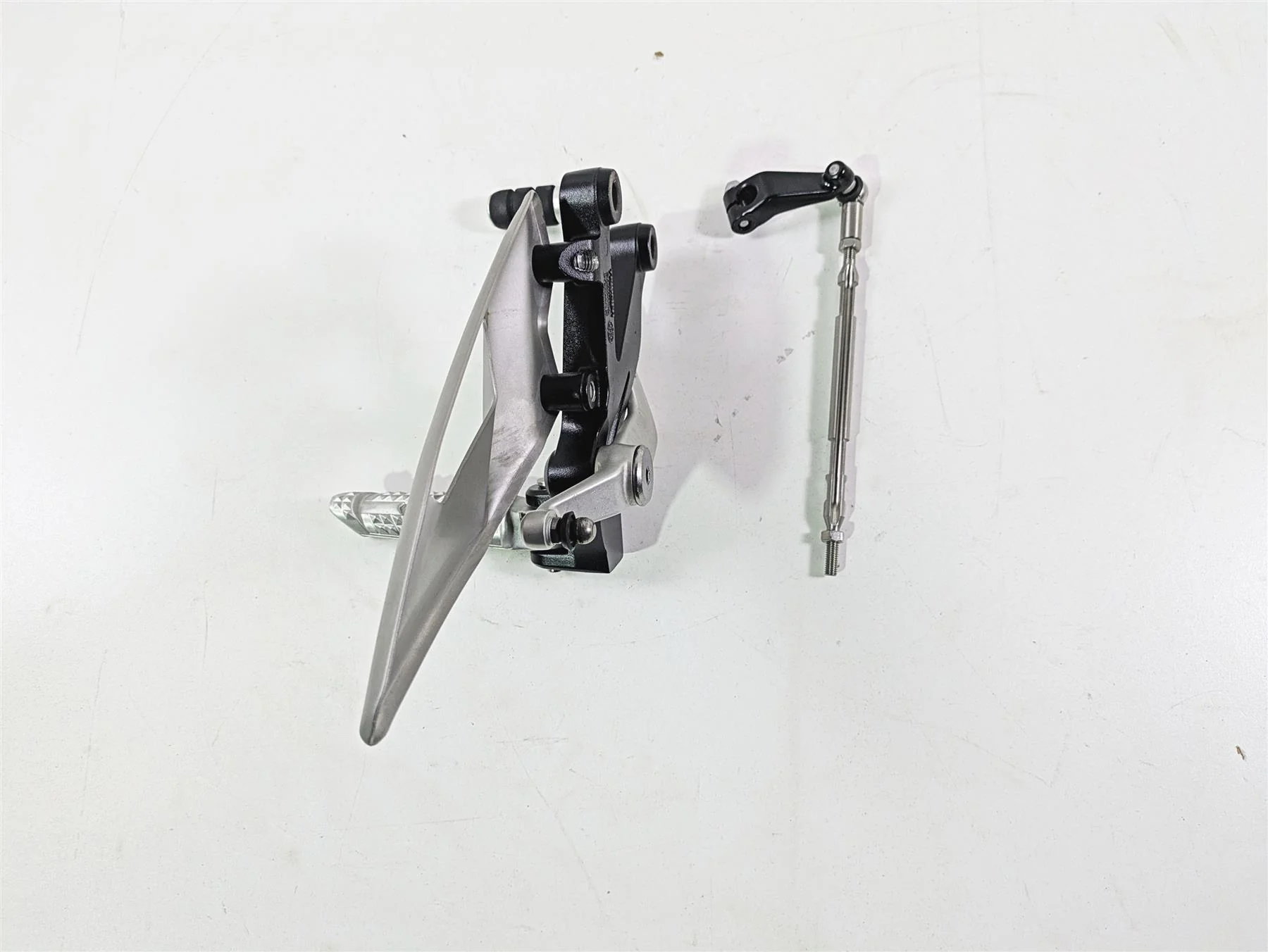 2024 Triumph Street Triple 765 R Left Rider Footpeg + Shifter & Links T2088025 - Image 2